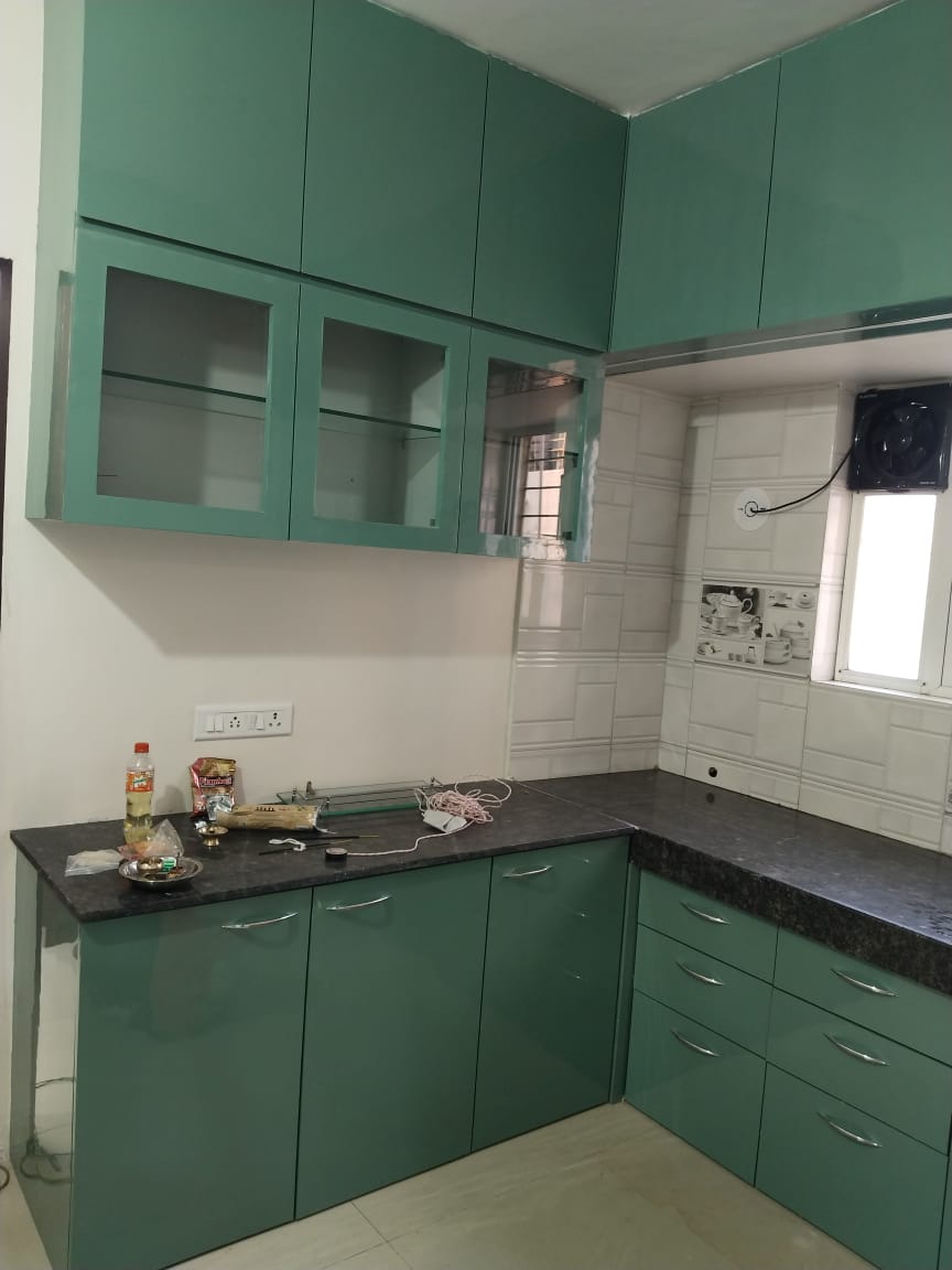 Green modular kitchen cabinetry