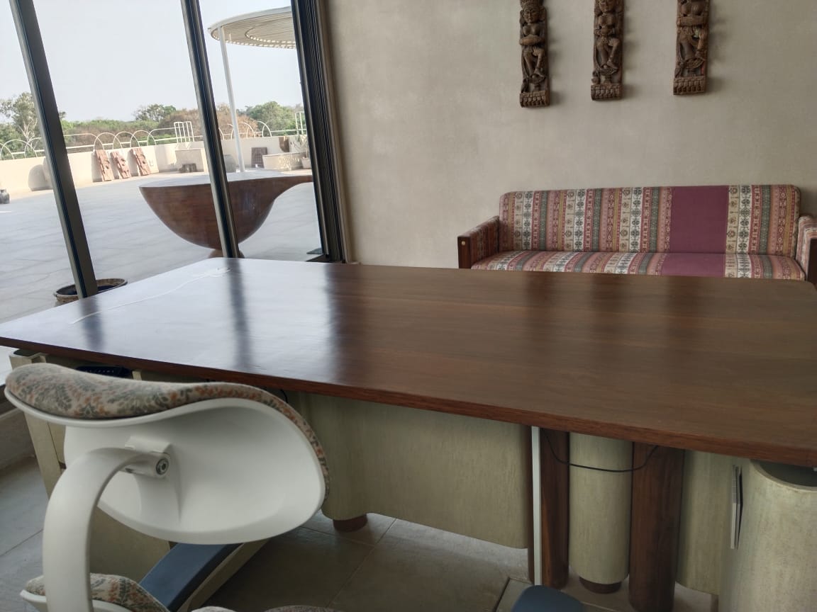 Terrace dining table with lounge seating